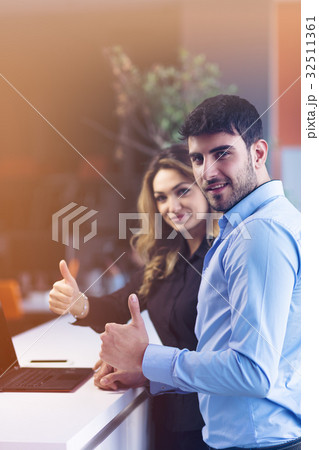 Young couple working together on a laptop in the 32511361