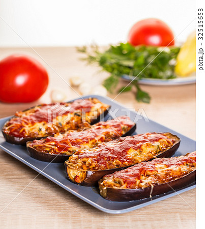Baked eggplants with cheese Baked eggplants with cheese 32515653