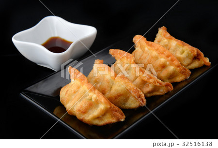 Deep fried gyoza crispy and golden colour. Deep fried gyoza crispy and golden colour. 32516138