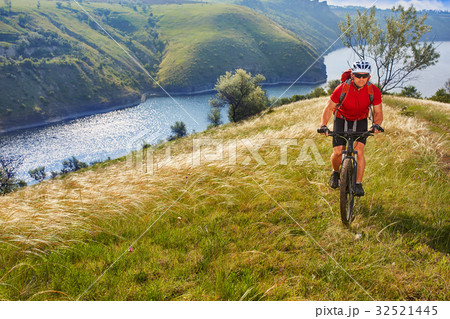 Adventure mountain biking on riverside Adventure mountain biking on riverside 32521445