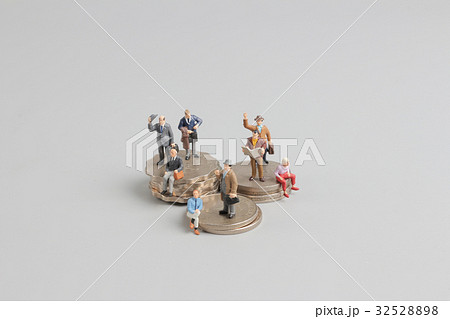 Business man on the top of coins stack 32528898