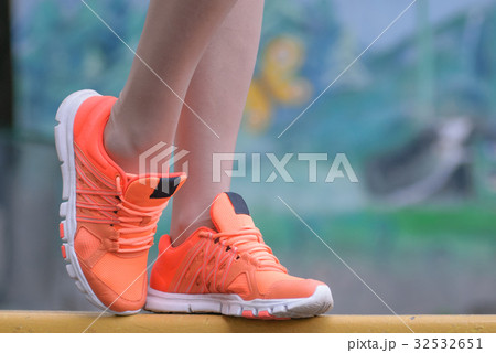 Close up of female feet with snickers. 32532651