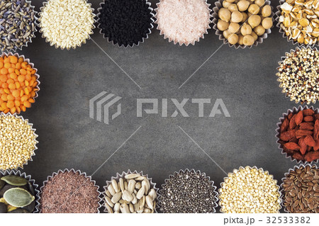 Various superfoods on gray table Various superfoods on gray table 32533382