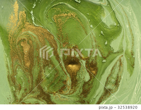 Marbled green and gold abstract background. Liquid Marbled green and gold abstract background. Liquid 32538920