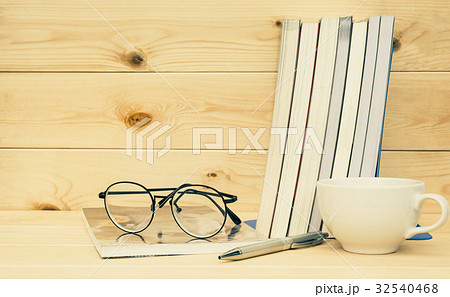 Books with glasses above. Book with glasses Books with glasses above. Book with glasses 32540468