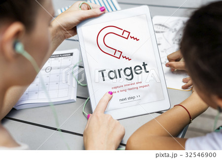 Women working on digital device network graphic overlay 32546900