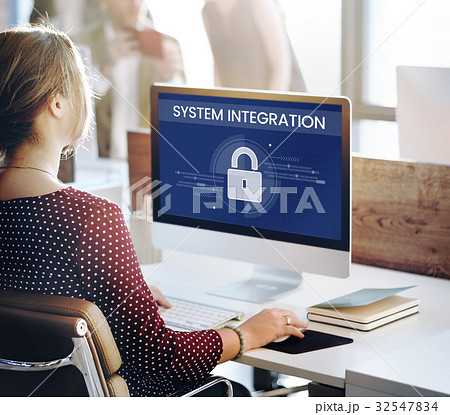 Woman working on computer network graphic overlay 32547834