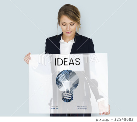 Woman holding banner of creative ideas digital technology light bulb Woman holding banner of creative ideas digital technology light bulb 32548682