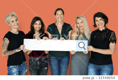 Group of women smiling and hodling search blank banner 32549050