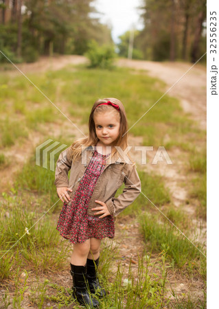 Happy girl in a summer park 32556235
