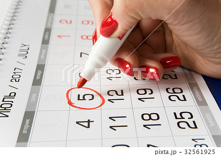 Calendar with a dedicated date on July 5th. Calendar with a dedicated date on July 5th. 32561925