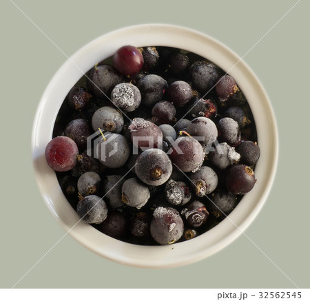 Frozen black currants view from above Frozen black currants view from above 32562545