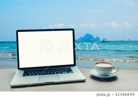Laptop computer with blank white screen on table Laptop computer with blank white screen on table 32566649