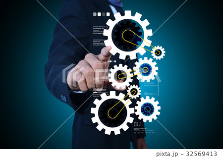 Business man with gear technology Business man with gear technology 32569413