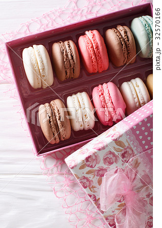 set of macaroons in a pink gift box close-up set of macaroons in a pink gift box close-up 32570166