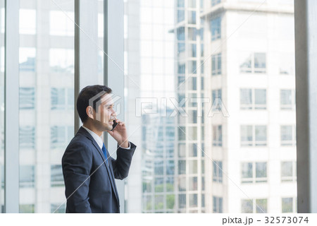 Mature and confident business executive looking  32573074