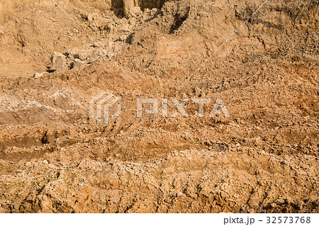 Clay and sand in the quarry. unusual background  32573768