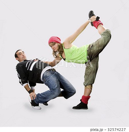 Teenagers dancing breakdance in action 32574227