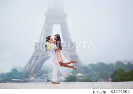 Romantic couple together in Paris Romantic couple together in Paris 32574600