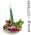Herb in a basket isolated on white background. 32579089