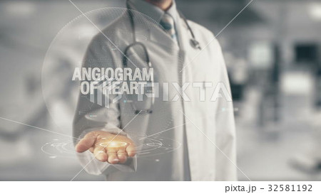 Doctor holding in hand Angiogram Of Heart 32581192