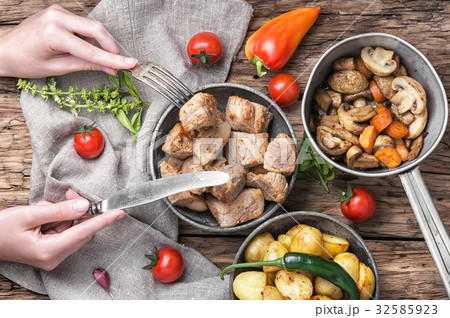 portion roast pork meat 32585923