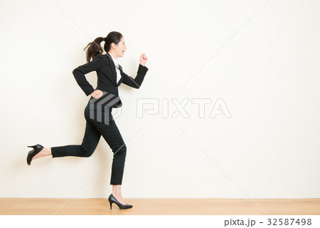 businesswoman with running on white background 32587498