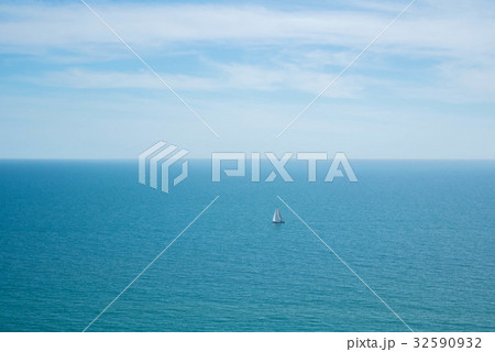 A lonely sailing ship in the water A lonely sailing ship in the water 32590932