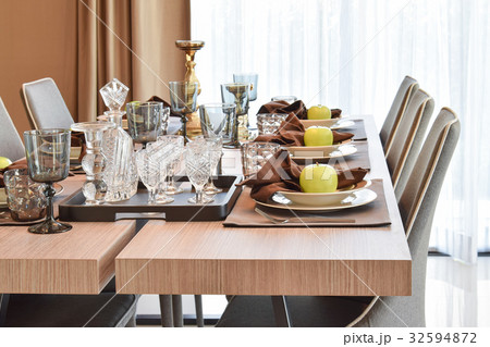 dining table and chairs with elegant table setting dining table and chairs with elegant table setting 32594872