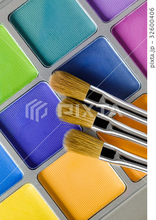 Palette of multicoloredeye shadow and makeup brush Palette of multicoloredeye shadow and makeup brush 32600406