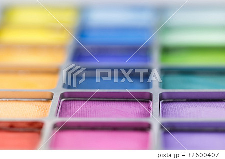 pallet of colored eye shadows, texture. Shallow 32600407