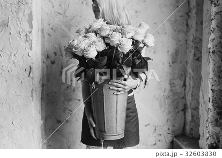 Woman Hands Holding Beautiful Flowers Bouquet 32603830