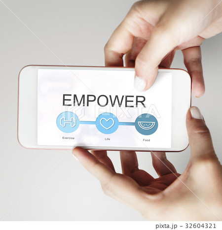 Hands working on digital device network graphic overlay Hands working on digital device network graphic overlay 32604321