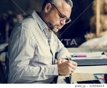 Businessman Working Writing on Paper at Office 32608834