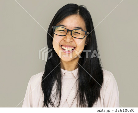Young asian girl smiling studio portrait 32610630