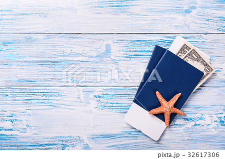 Passports with boarding pass and dollar banknotes Passports with boarding pass and dollar banknotes 32617306