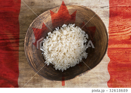 Poverty concept, bowl of rice with Canada flag 32618689