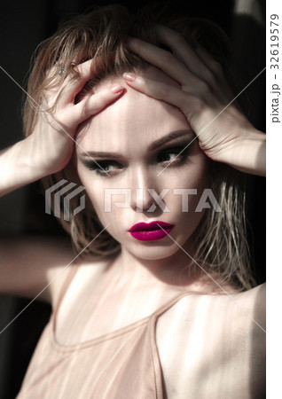 Portrait of beautiful girl model with pink lips Portrait of beautiful girl model with pink lips 32619579