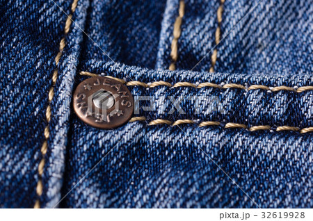 Jeans close-up. Clasps, pocket, seams Jeans close-up. Clasps, pocket, seams 32619928