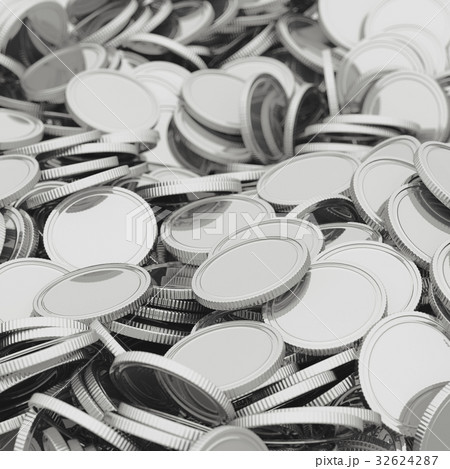 Scattered silver coins closeup background 32624287