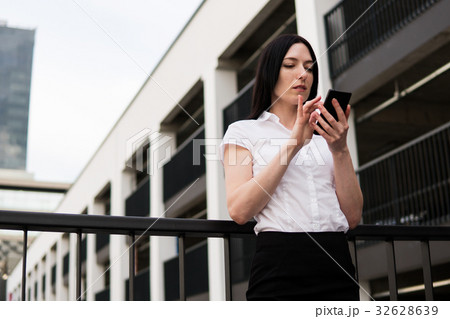 business woman using smartphone business woman using smartphone 32628639