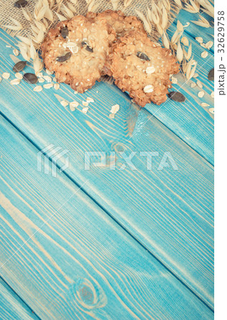 Vintage photo, Oatmeal cookies and ears of oat Vintage photo, Oatmeal cookies and ears of oat 32629758