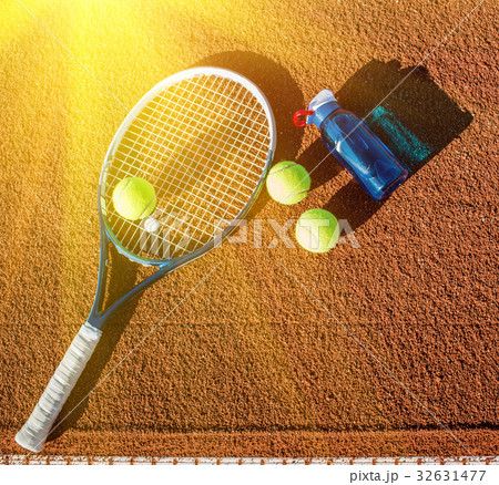 Tennis equipment laying on the court Tennis equipment laying on the court 32631477