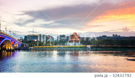 Sunset over Li river with bridge and Xiaoyao tower Sunset over Li river with bridge and Xiaoyao tower 32632792