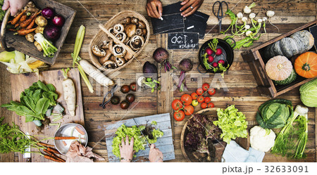 Aerial view of fresh organic various vegetable on wooden table 32633091