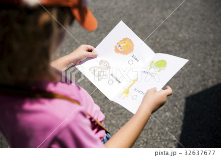 Kid hands holding animal book Kid hands holding animal book 32637677