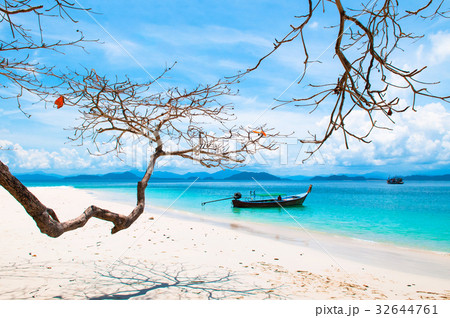 White sand beach with fishing boat, Ranong, Tha White sand beach with fishing boat, Ranong, Tha 32644761
