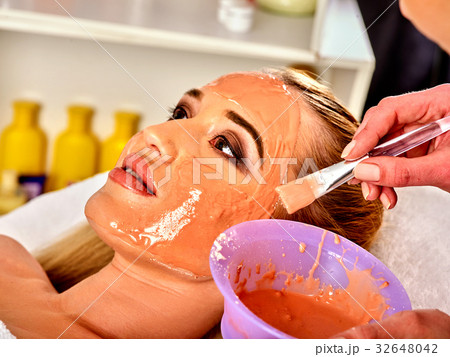 Collagen face mask. Facial skin treatment. Woman 32648042