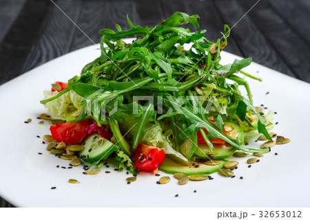 Salad of fresh avocado, cucumber, tomato,cabbage 32653012