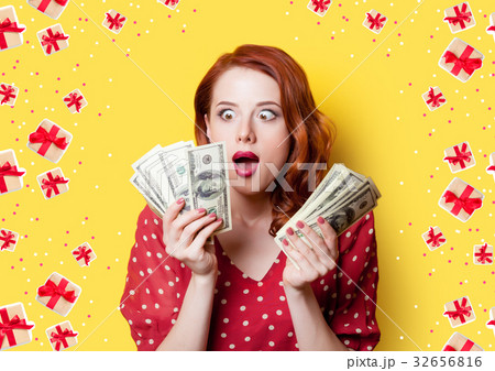 girl in red dress with money 32656816